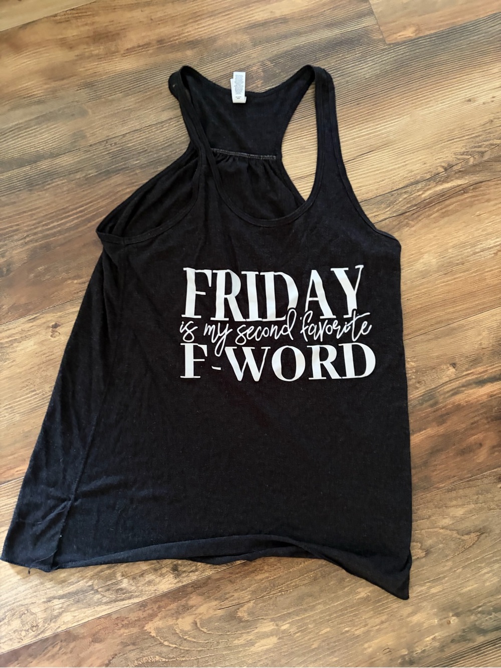 Bella Canvas Black Racerback Tank with White Graphic Text